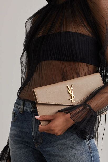 ysl beige uptown pouch|saint laurent quilted pouch.